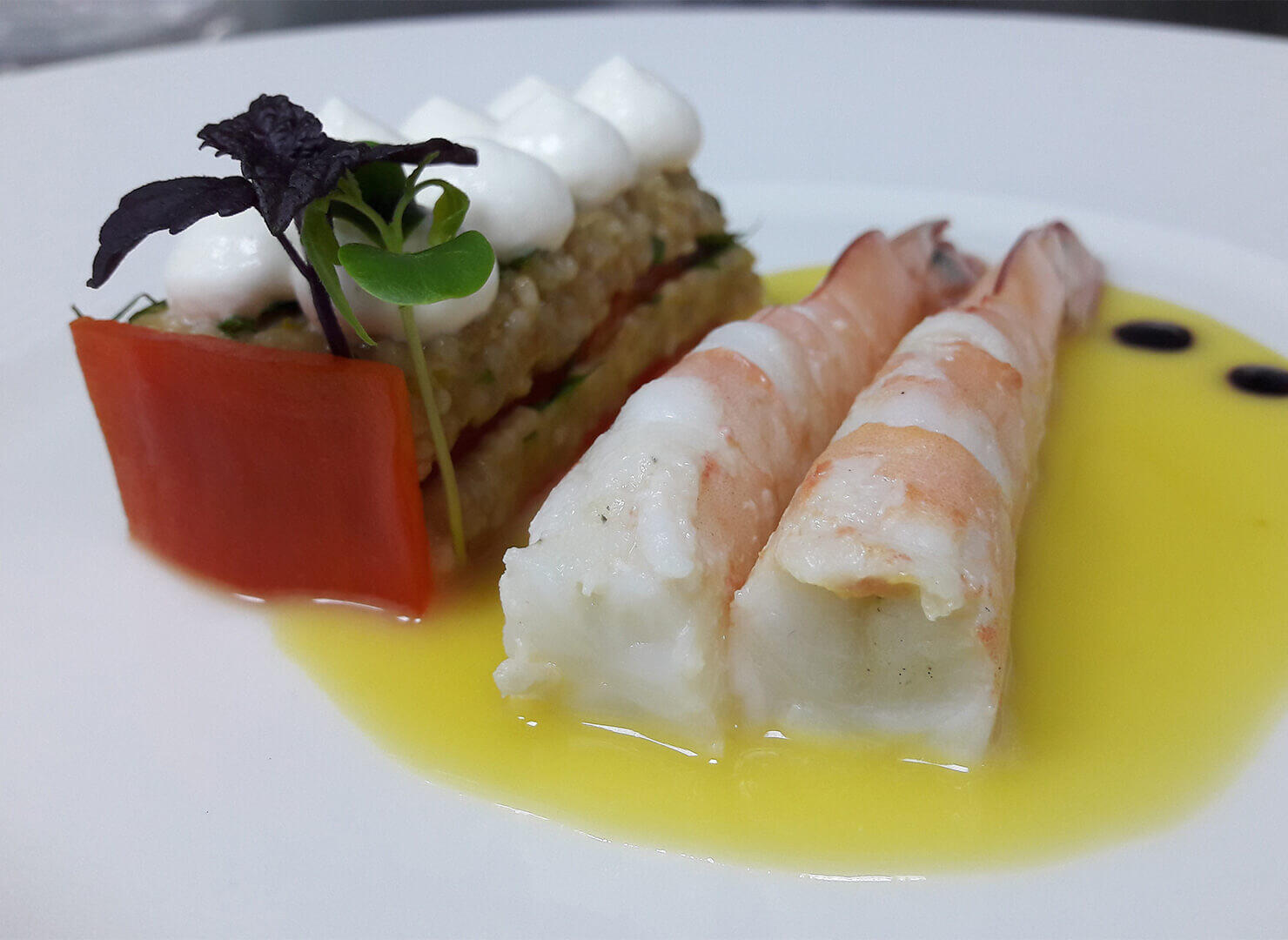 Trahanas (frumenty) with sweet red pepper confit, marinated shrimps and goat cheese mousse